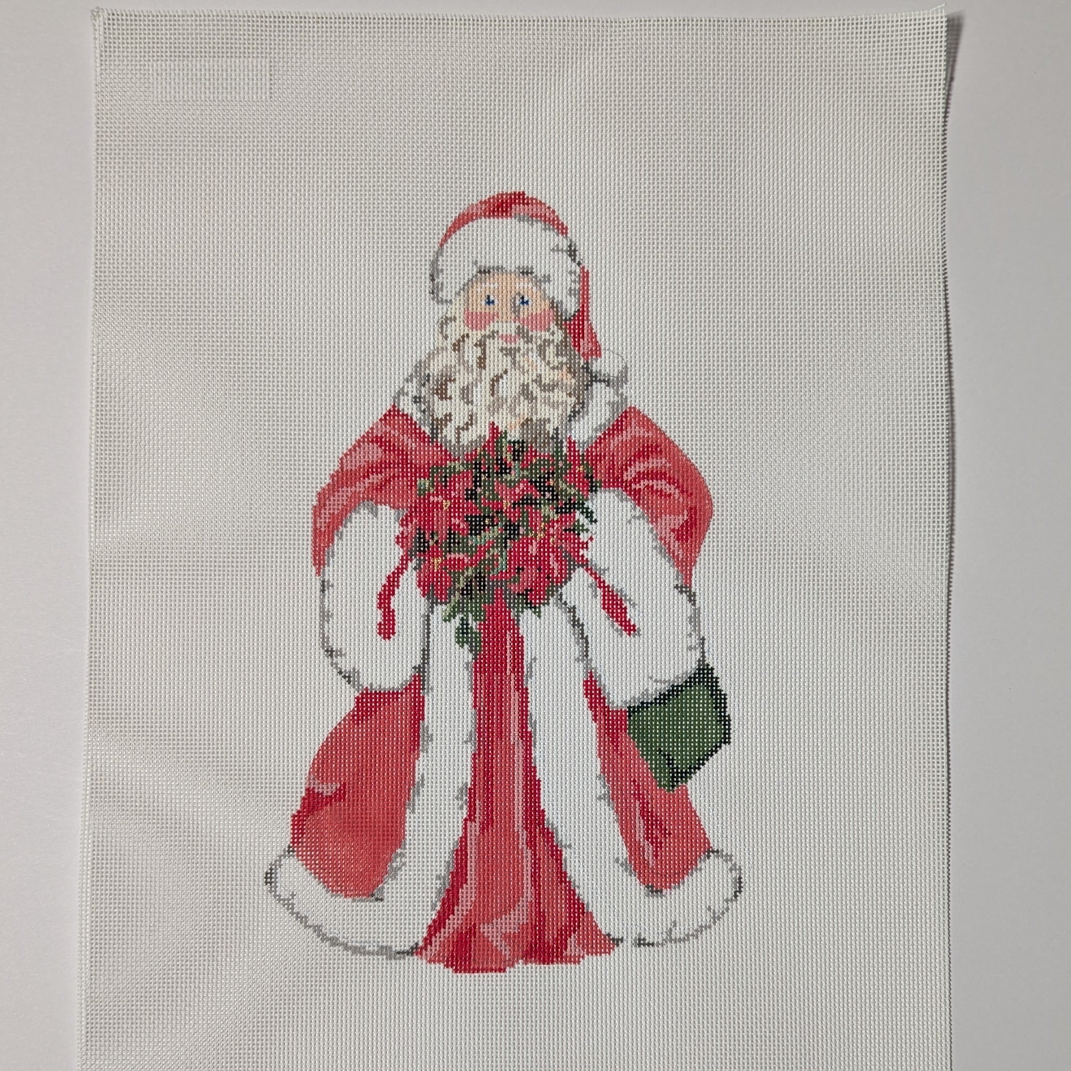Santa w. Poinsettia Stand Up