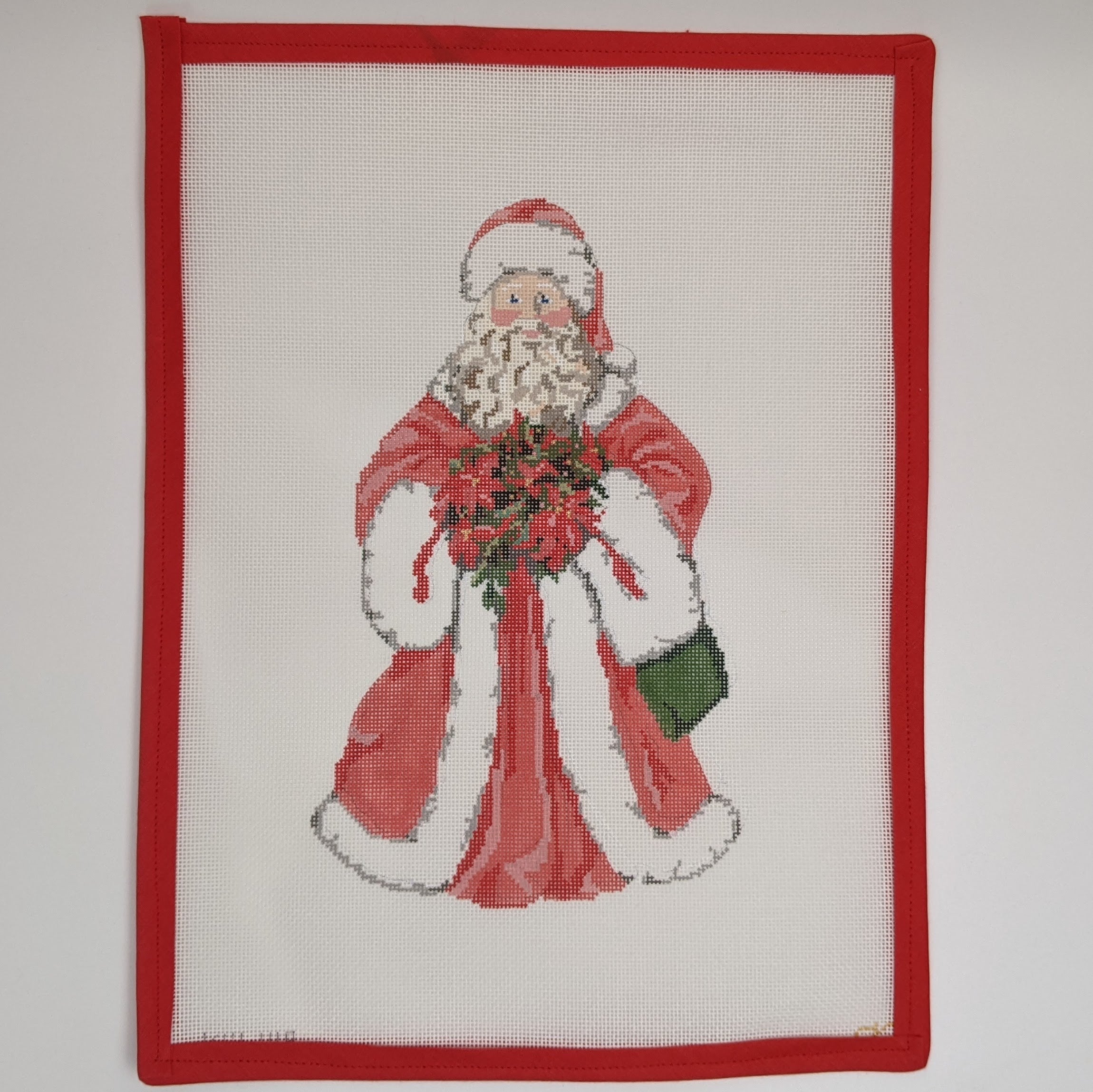 Santa w. Poinsettia Stand Up