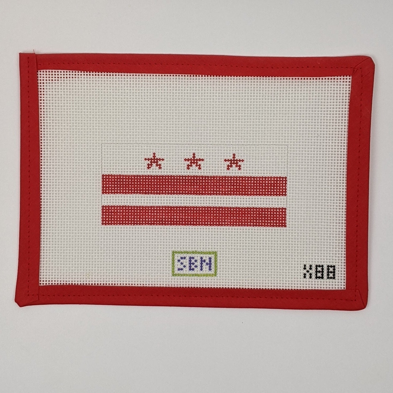 DC Flag ornament on 13 mesh