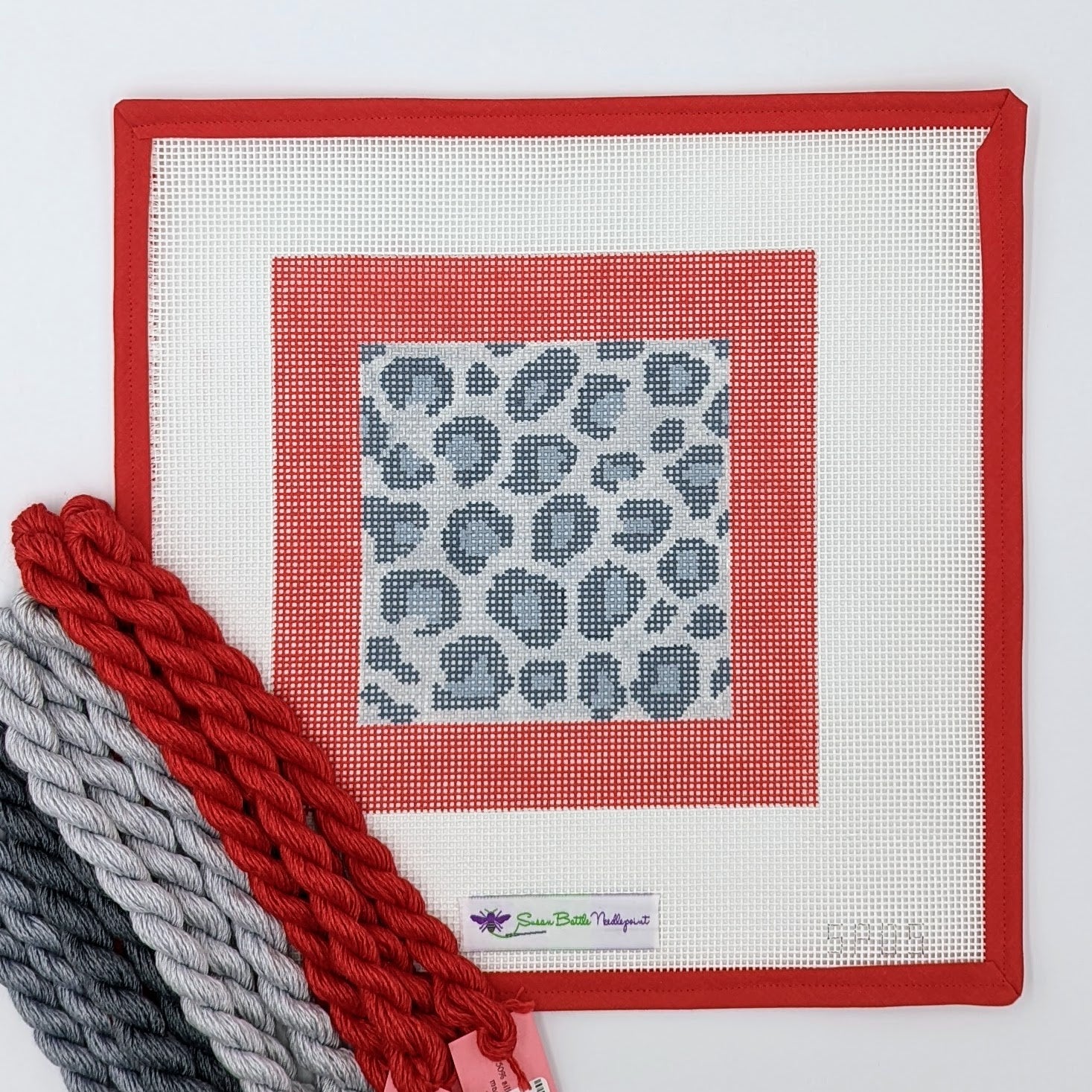 Snow Leopard with Red Border (on 10 mesh) WITH FIBERS